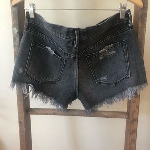 Free People distressed denim shorts size 28